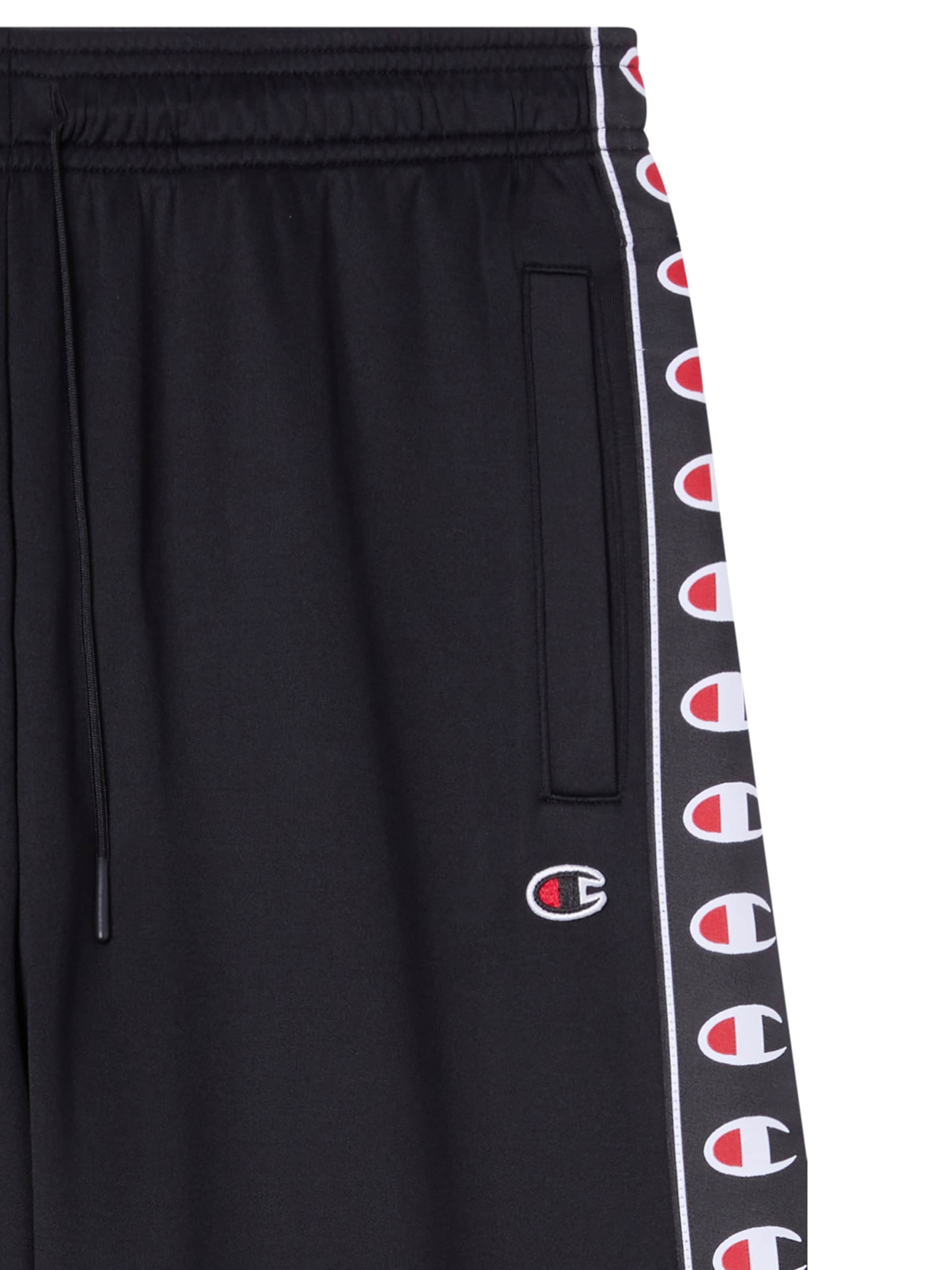 Champion Authentic Athletic ApparelLoosefit Hlače 'Hem' - crna boja