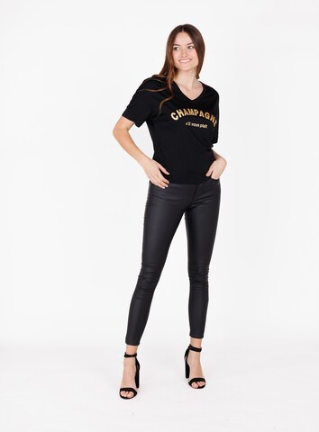 Tricou 'WT CHAMPAGNE' de la Key Largo pe negru