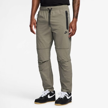 Nike Sportswear Tapered Pants 'Tech' in Green: front