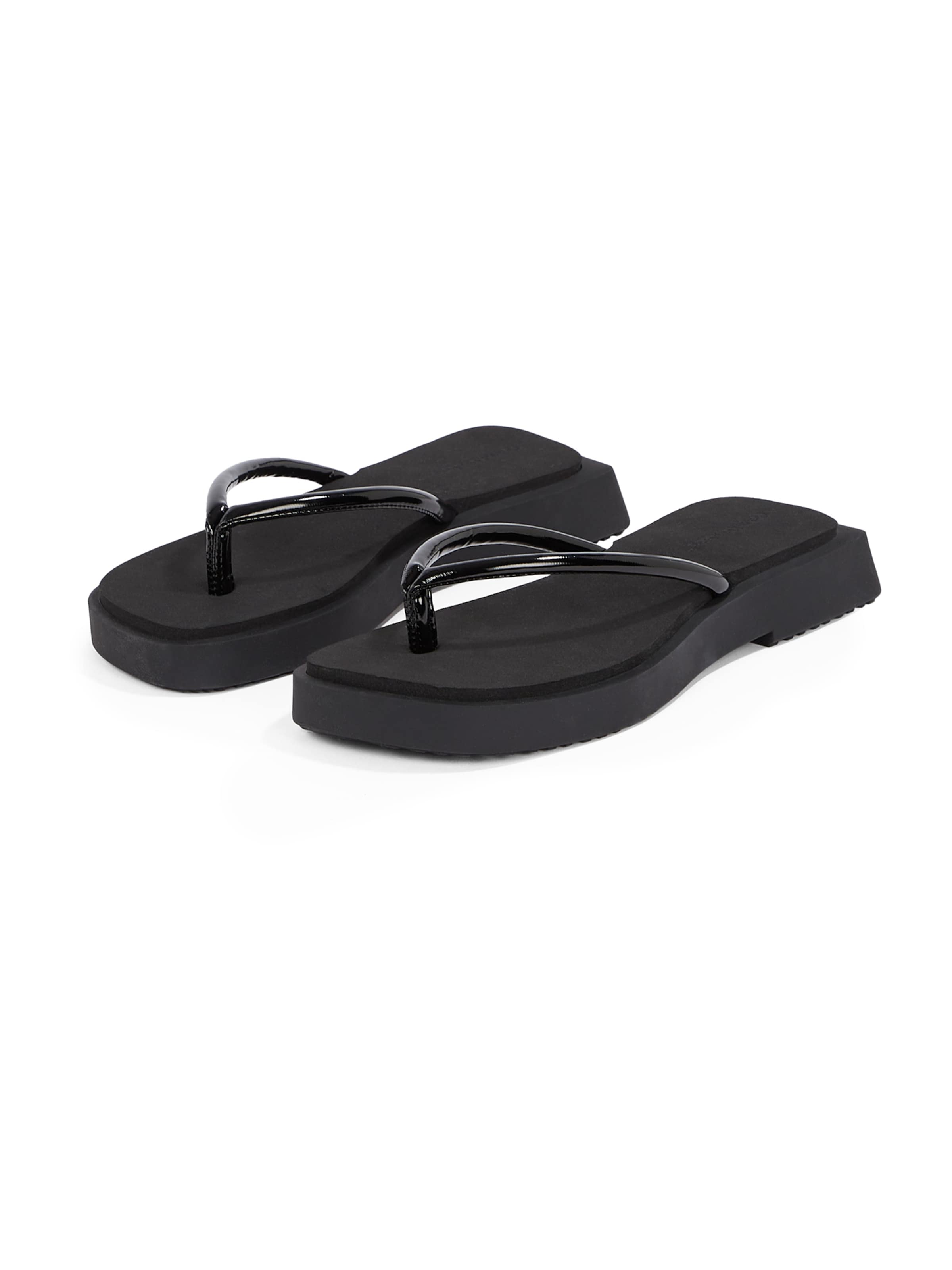 Calvin Klein T-Bar Sandals in Black