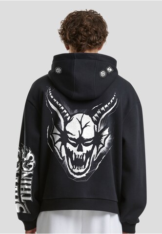 Merchcode Sweatshirt 'Stranger Things' in Zwart