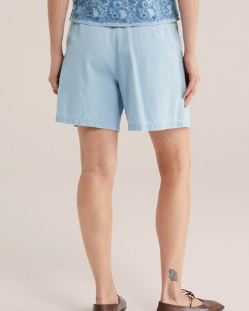 mėlyna WE Fashion Plačios klešnės Džinsai su kantu