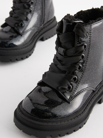 Bottes Next en noir