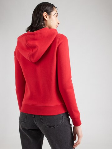 Veste de survêtement GUESS JEANS en rouge