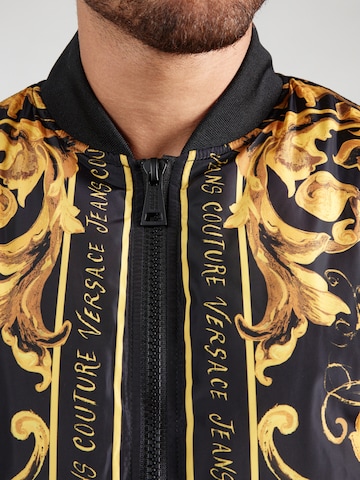 Versace Jeans Couture Övergångsjacka i svart