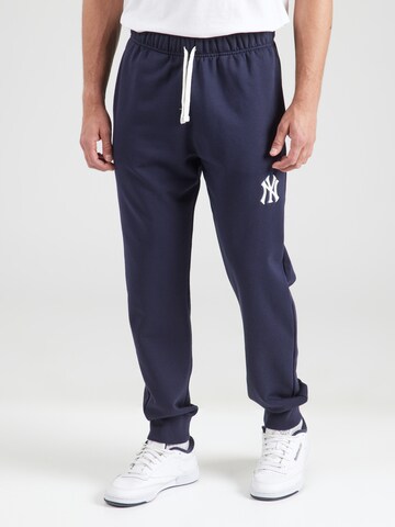 Champion Authentic Athletic Apparel - Tapered Pantalón en azul: frente
