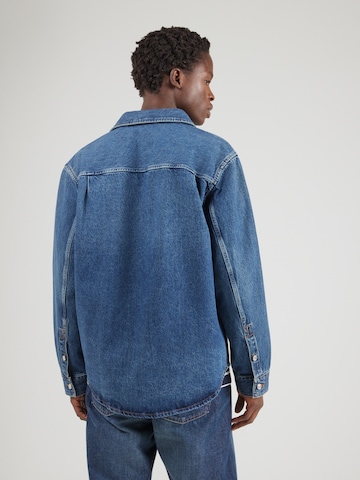 Calvin Klein Jeans Mugav suurus Triiksärk '90S HORIZON', värv sinine