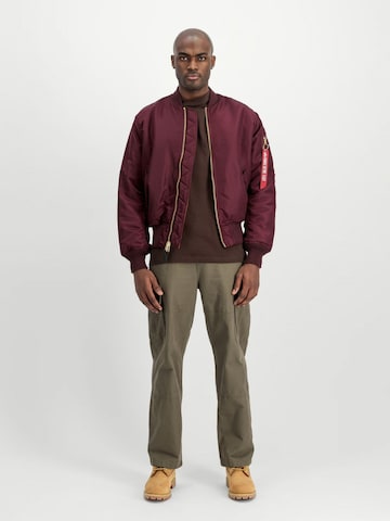 Veste mi-saison ALPHA INDUSTRIES en rouge : devant