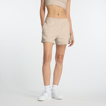 new balance Sports trousers in Beige: front