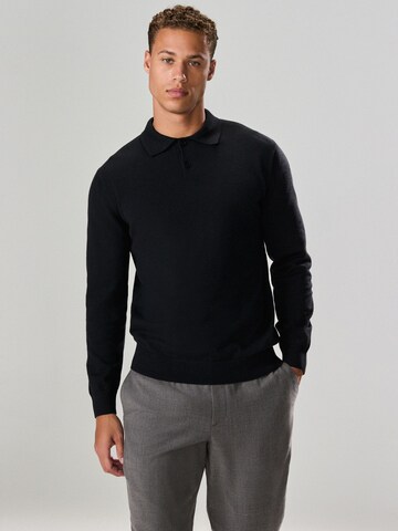 Next T-shirt i svart: framsida