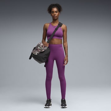PUMA Skinny Sportbroek in Lila