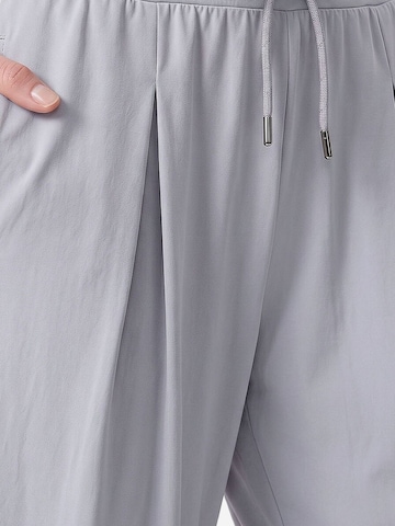 Pantaloni di Tommy Life in grigio