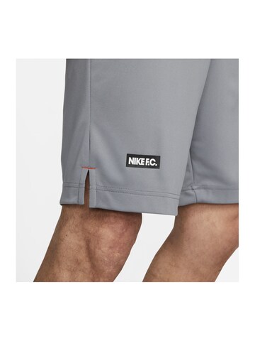 NIKE Regular Sports trousers in Grey