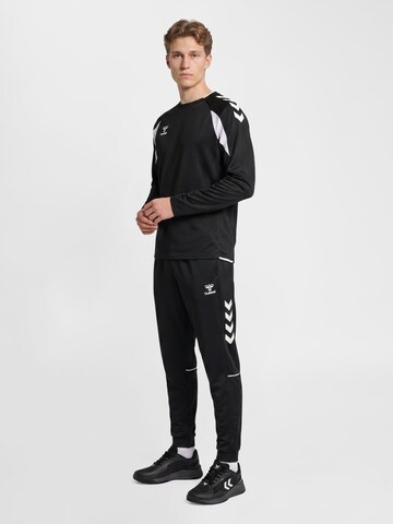 Hummel Regular Workout Pants 'Core 2.0' in Black