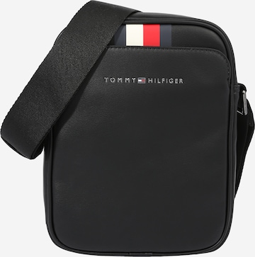 TOMMY HILFIGER Чанта за през рамо тип преметка в черно: отпред