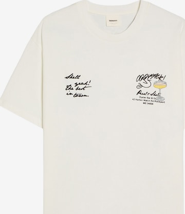Bershka Тениска 'AFFOGATO/OSTRAS' в бяло: отпред