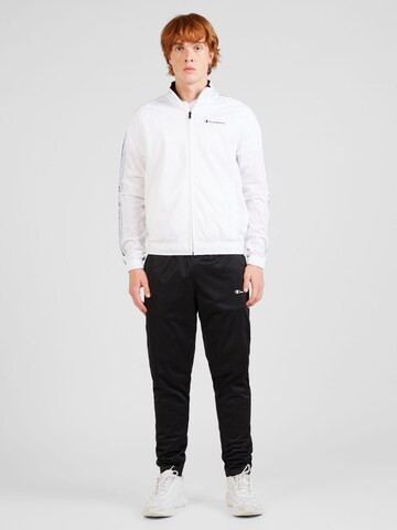 Champion Authentic Athletic Apparel Tracksuit in White: front