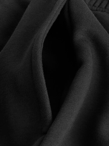 Tapered Pantaloni di Next in nero