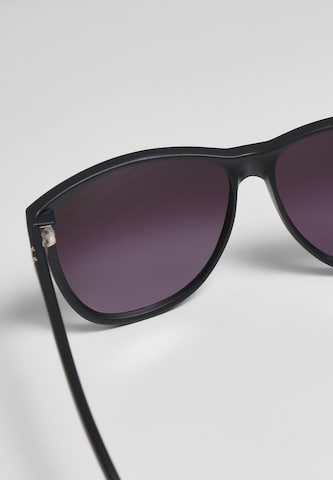 Lunettes de soleil 'Chirwa' Urban Classics en violet