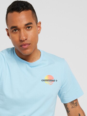 CONVERSE Bluser & t-shirts 'SUNSET' i blå