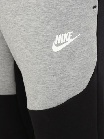 Nike Sportswear Zúžený Kalhoty – černá
