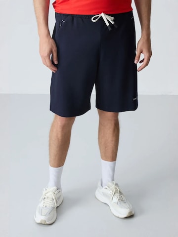 Pantaloni di Tommy Life in blu: frontale