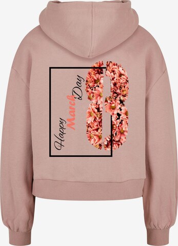 Sweat-shirt 'WD - Happy March Day' Merchcode en rose