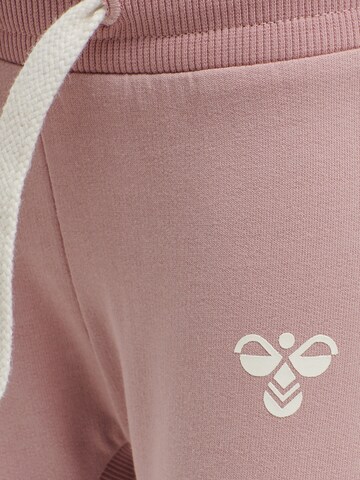 Effilé Pantalon de sport 'Apple' Hummel en rose