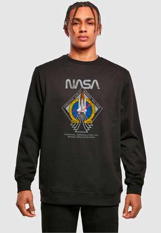 Merchcode Sweatshirt 'NASA - STS135' in Zwart: voorkant
