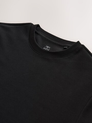 Next T-Shirt 'Motionflex' in Schwarz