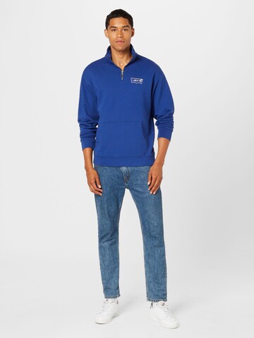 LEVI'S ® Sweatshirt 'RLXD Graphic 1/4 Zip Pkt' in Blau