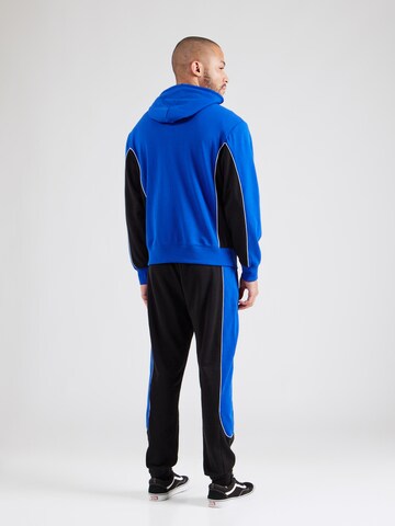 Tuta da jogging di Champion Authentic Athletic Apparel in blu