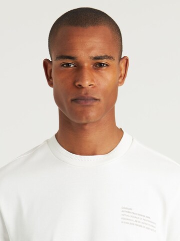 T-Shirt 'Xpose' CHASIN' en blanc