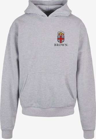 Merchcode Sweatshirt 'Brown University - Emblem' in Grijs: voorkant
