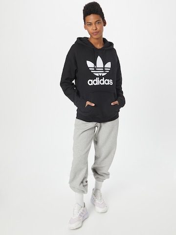 ADIDAS ORIGINALS Collegepaita 'Trefoil' värissä musta