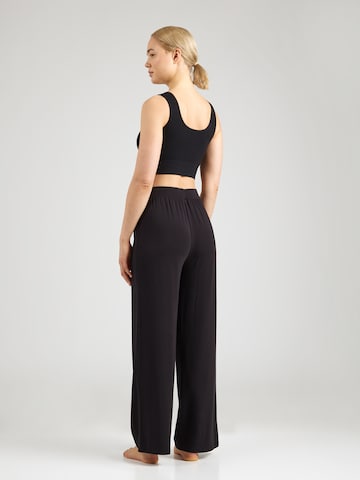 CURARE YogawearLoosefit Sportske hlače - crna boja