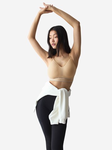 TRIUMPH Bralette Sports bra ' Triaction Cardio Breeze ' in Beige