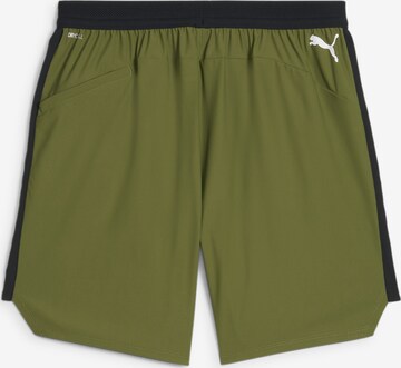 Regular Pantaloni sport 'Fuse 7' de la PUMA pe verde
