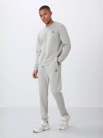 Tommy Life Joggingpak in Grijs: voorkant