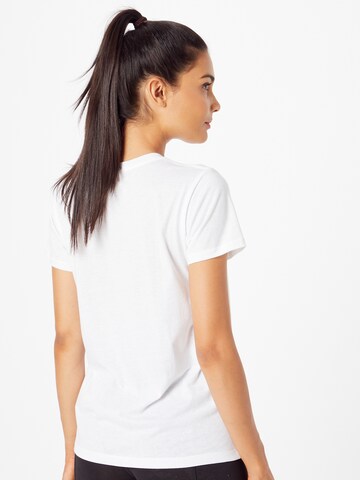 T-shirt fonctionnel UNDER ARMOUR en blanc