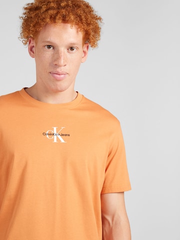 Calvin Klein Jeans Koszulka w kolorze pomarańczowy