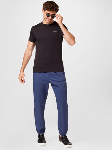 Nike Sportswear Tapered Broek in Blauw