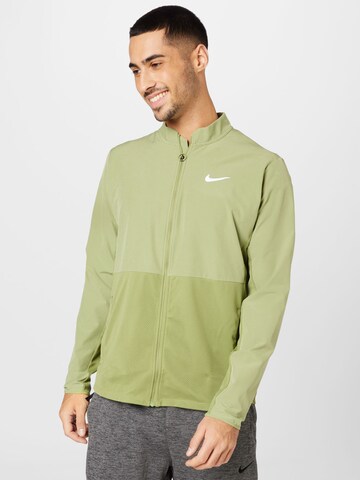 NIKE Training Jacket in Green: front