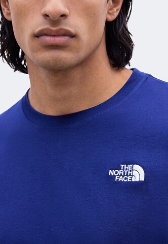 THE NORTH FACE Bluser & t-shirts 'EVOLUTION SIMPLE DOME' i blå
