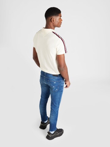 Tommy Jeans regular Jeans 'AUSTIN SLIM TAPERED' i blå