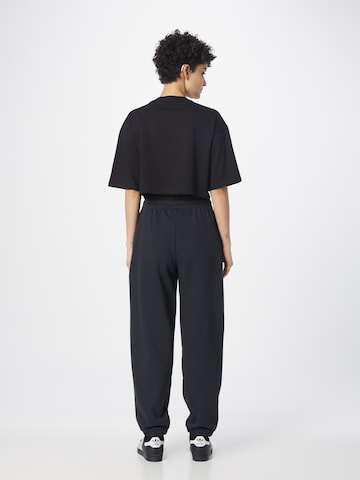 Effilé Pantalon 'Essentials' new balance en noir