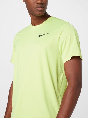 NIKE - Camiseta funcional 'Pro' en amarillo