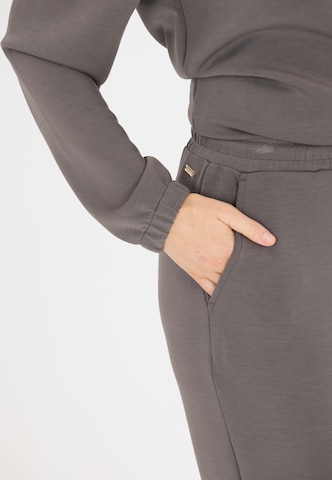 Athlecia Regular Sweatpants 'Jacey' in Braun