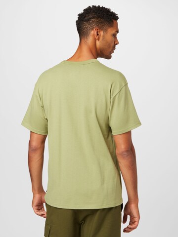 Nike Sportswear Majica 'Esential' | zelena barva