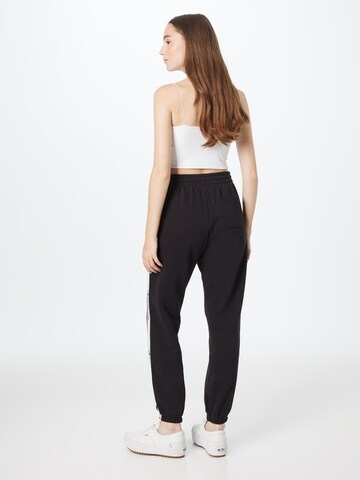 Champion Authentic Athletic Apparel Tapered Broek in Zwart